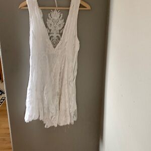 Size 8 , runs small, white boho dress.